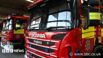 Fire crews tackle roof blaze at community building