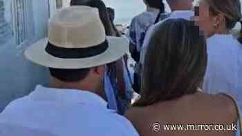 Thousands of tourists filmed queuing for sunrise social media snap on Santorini