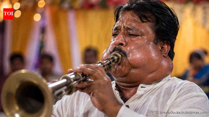 Every time he blows into the instrument, his neck balloons out: What is happening to this musician?