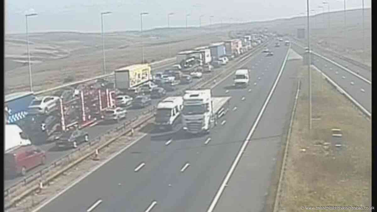M62 fire LIVE as queues stretch for miles after lanes closed
