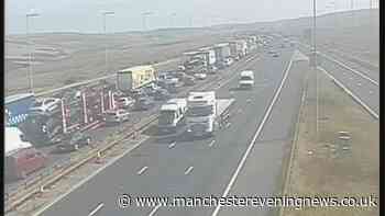 M62 fire LIVE as queues stretch for miles after lanes closed