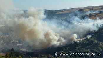 People evacuated from homes as crews battle huge wildfires across Wales - live updates
