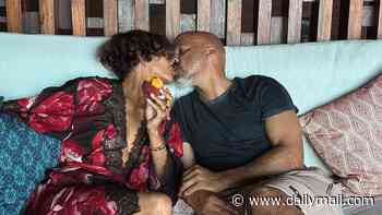 Braless Halle Berry wows in a silk robe as she tucks into strawberries and smooches fiancé Van Hunt in sizzling snaps on her 60th birthday