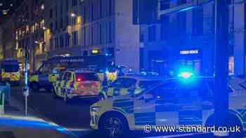 Police descend on London's Moorgate after late-night stabbing