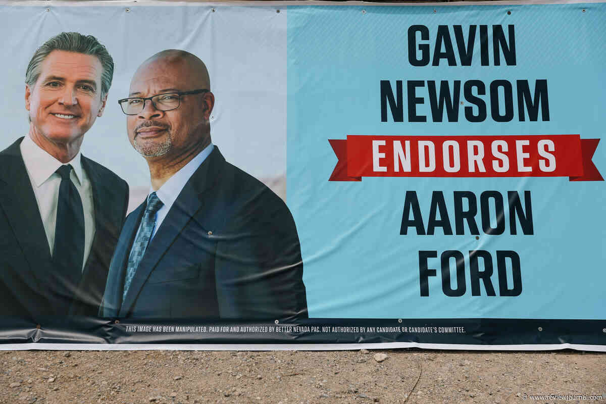 Political signs in Las Vegas with Newsom’s image defaced with swastikas