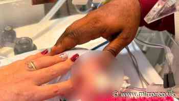 'Dead' baby found alive in body bag welcomed back home after 'miracle'