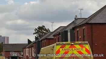 Arrest attempt leads to police standoff in Salford with 'man on roof throwing tiles'