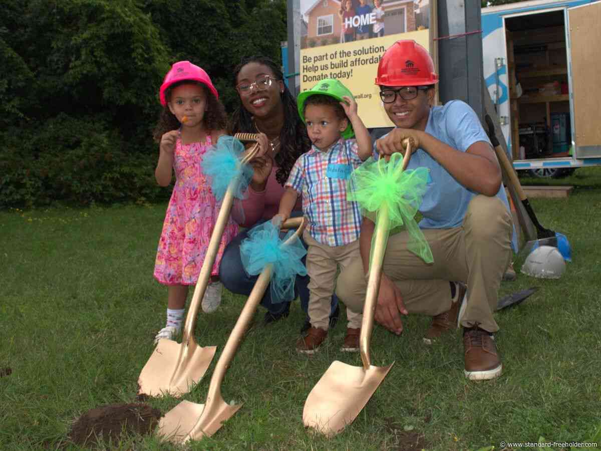 It's official! Three new families celebrate forever homes thanks to Habitat for Humanity
