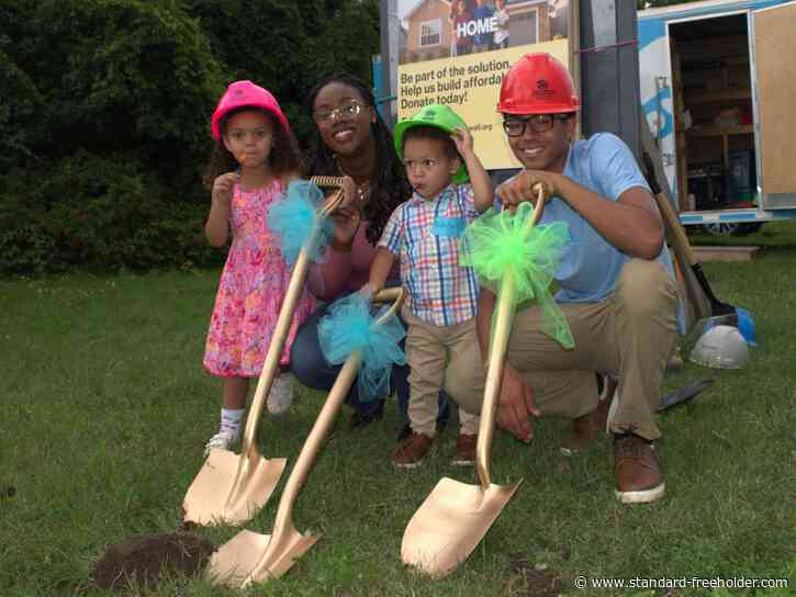 It's official! Three new families celebrate forever homes thanks to Habitat for Humanity