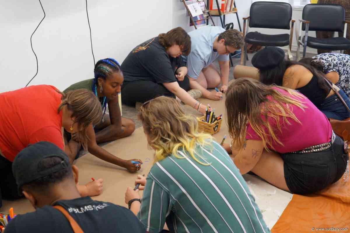 Banner-making workshop ahead of Up Here gets people to define art