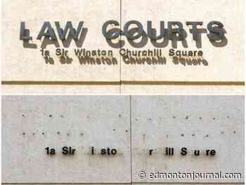 Vandals snatch signage off side of Edmonton Law Courts building