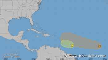 2 tropical waves cross the Atlantic but dry air and wind shear keeping them in check