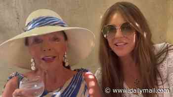 Joan Collins, 93, jokes she's 'spending all Elizabeth Hurley's money' as they enjoy lunch in St Tropez with Damian and Billy Ray Cyrus