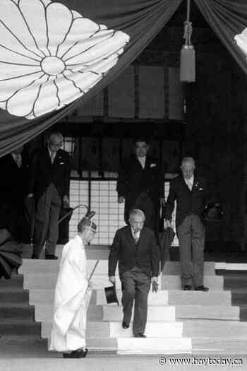 Japanese Defense Minister Koizumi prays at shrine seen by neighbors as symbol of Japanese militarism