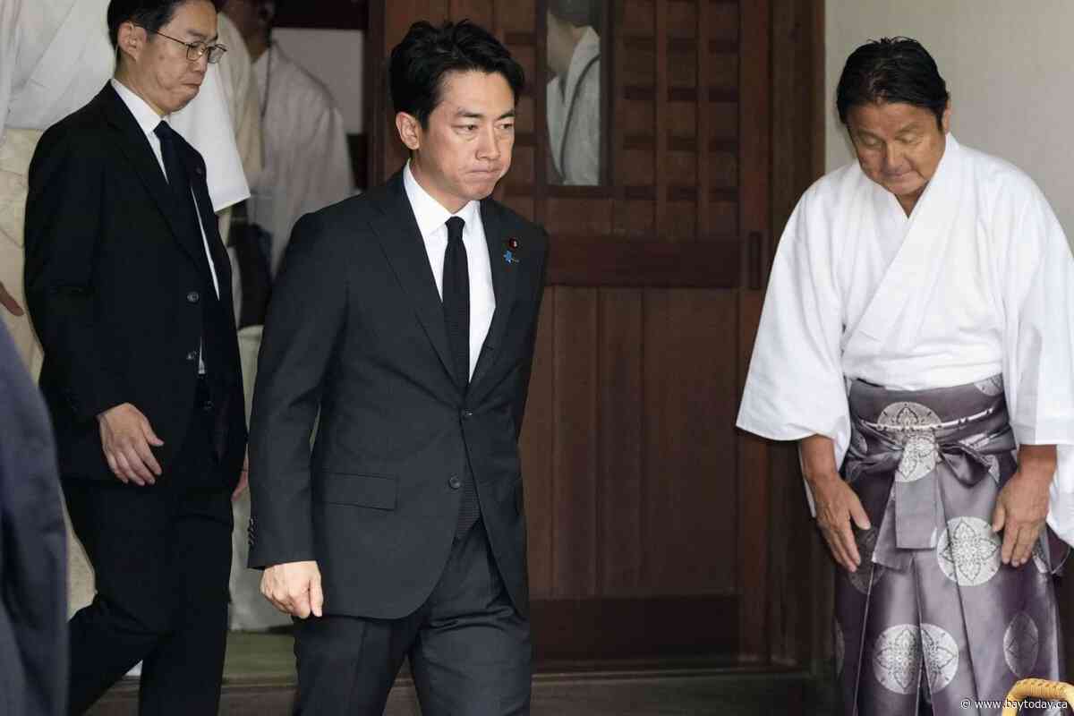 Japan's defense chief visits shrine neighbors see as symbol of Japanese militarism