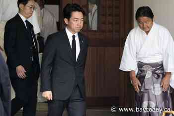 Japan's defense chief visits shrine neighbors see as symbol of Japanese militarism