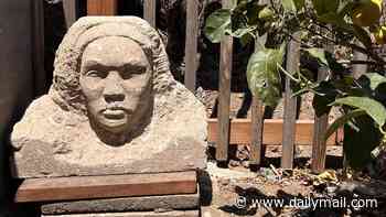 Couple stunned to dig up mysterious stone statue in their garden... now its incredible story has been revealed