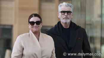 Pierce Brosnan, 73, and wife Keely, 62, make a rare appearance together as they put on a loved-up display in Sydney