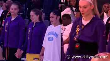 Confused WNBA stars struggle to keep a straight face during bizarre whistled rendition of national anthem