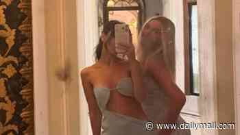 Harper Beckham, 15, poses for a fun mirror selfie with 'bestie' Jackie Apostel, 30, on family holiday in Italy as her brother Romeo and Kim Turnbull enjoy romantic break in  St Tropez