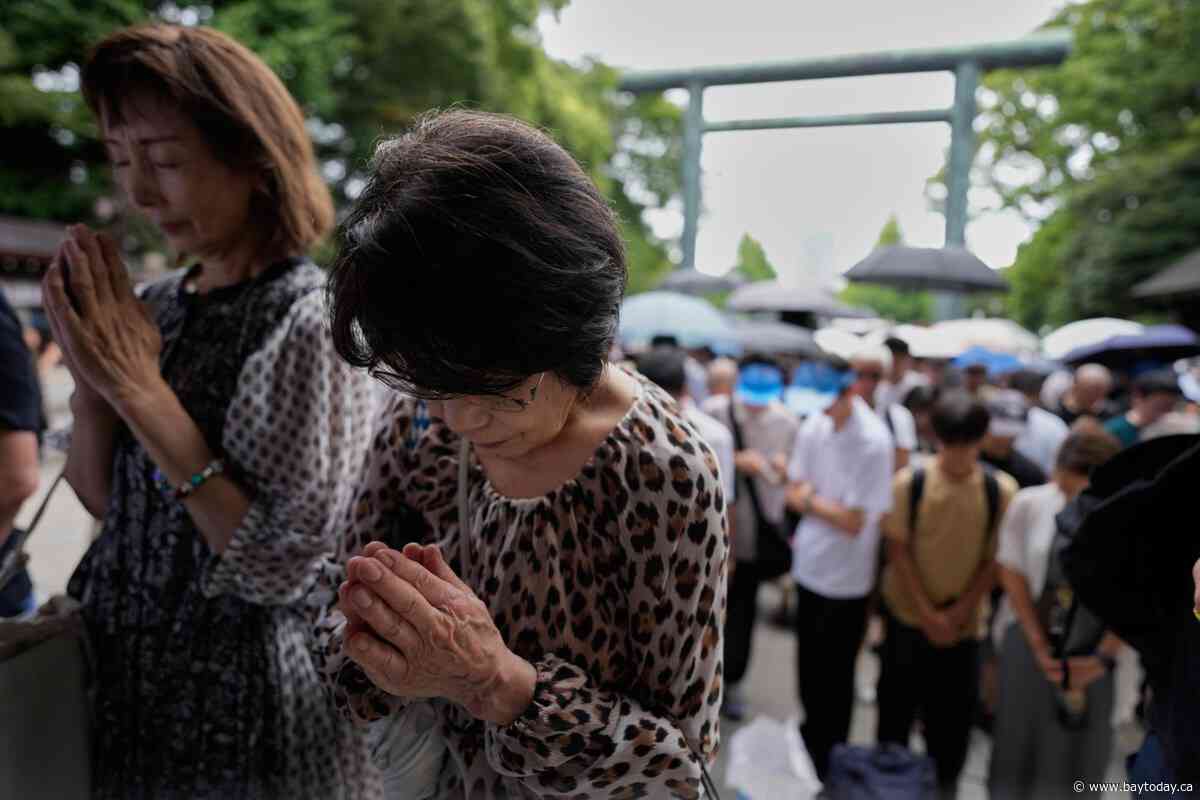 Japanese leader skips controversial shrine visit, avoids mention of remorse on surrender anniversary