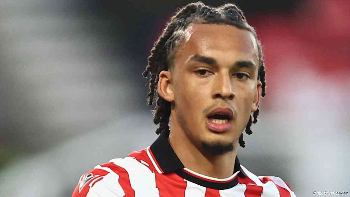 Boro sign Spurs defender Phillips on five-year deal