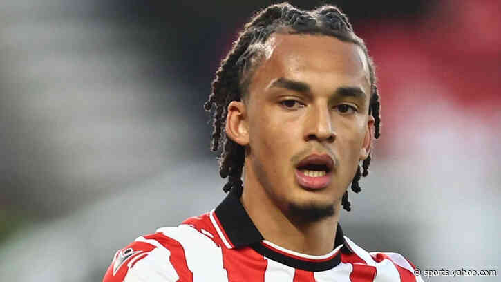 Boro sign Spurs defender Phillips on five-year deal