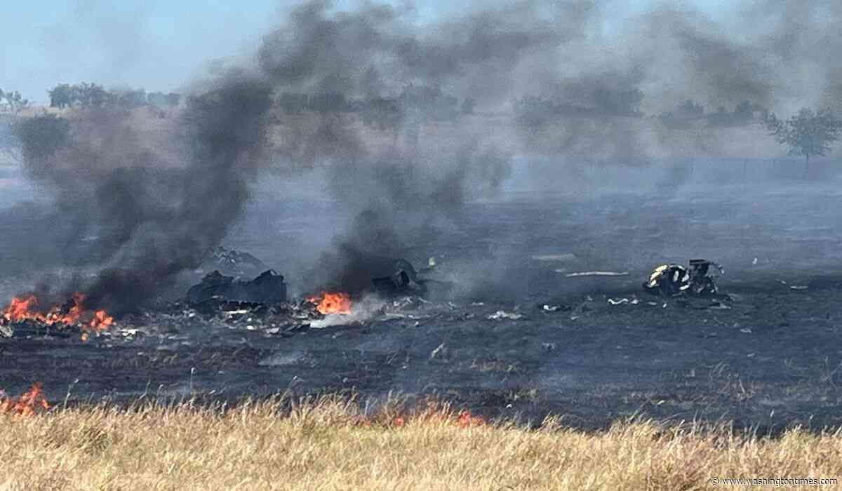 Army temporarily halts Apache helicopter training missions after Texas crash that killed 2