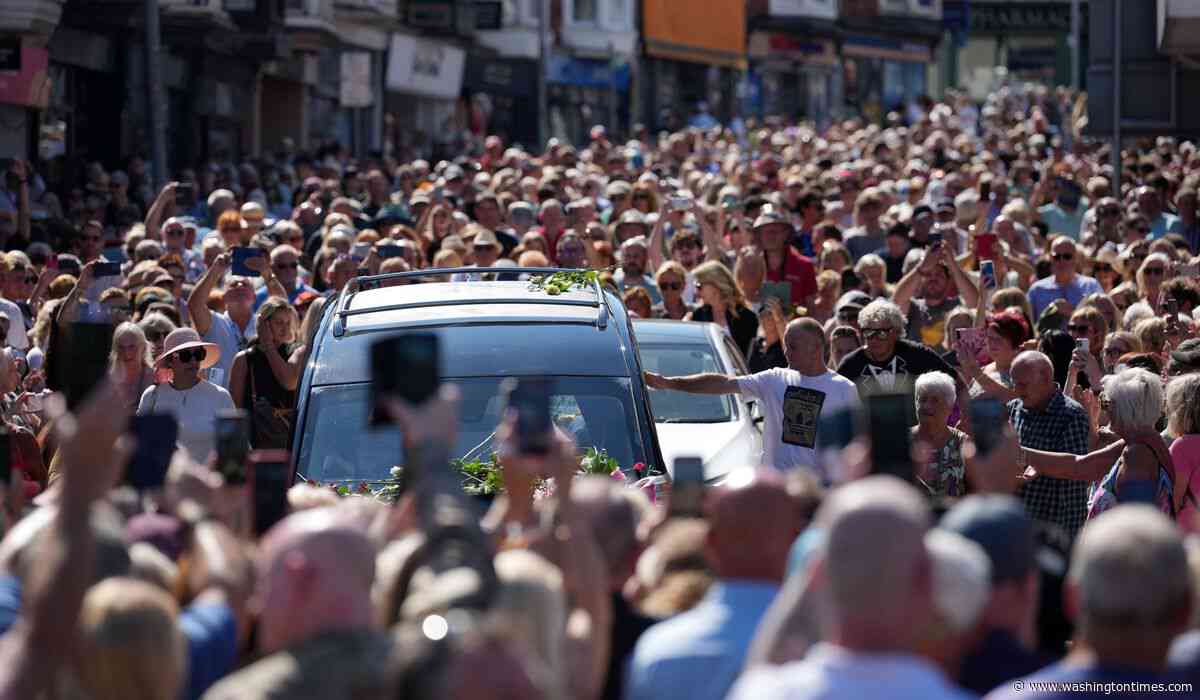 Bonnie Tyler fans line the streets of a Welsh village as her coffin is brought home