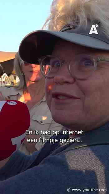 Op een vol Nemo-dak keken Amsterdammers naar de eclips