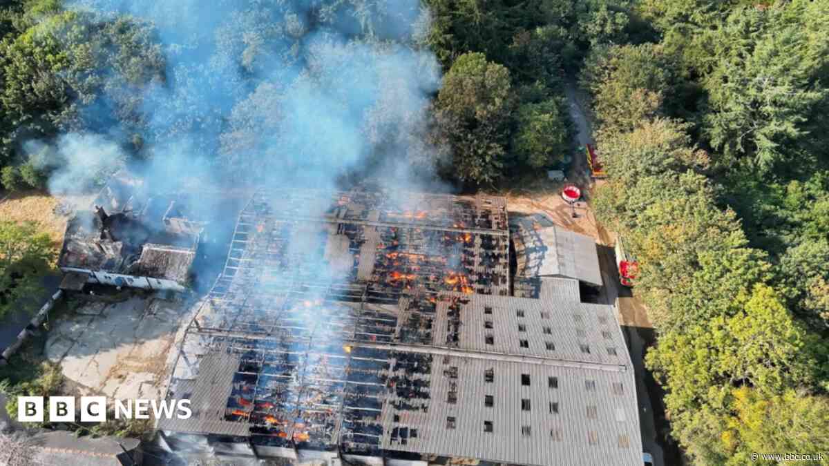 Crews tackle barn fire involving 2,000 hay bales