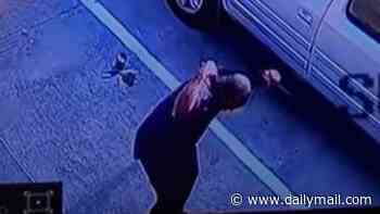 Moment brawny Texas cop is repeatedly attacked by furious BIRD in parking lot outside his precinct