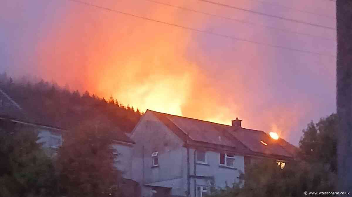 Terrifying photos show wildfire near homes as another blaze rages in Rhondda