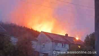 Terrifying photos show wildfire near homes as another blaze rages in Rhondda