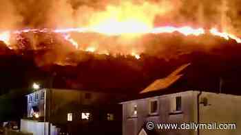 'Appalling' wildfire rages near people's homes in Wales as 200 soldiers are deployed to help firefighters