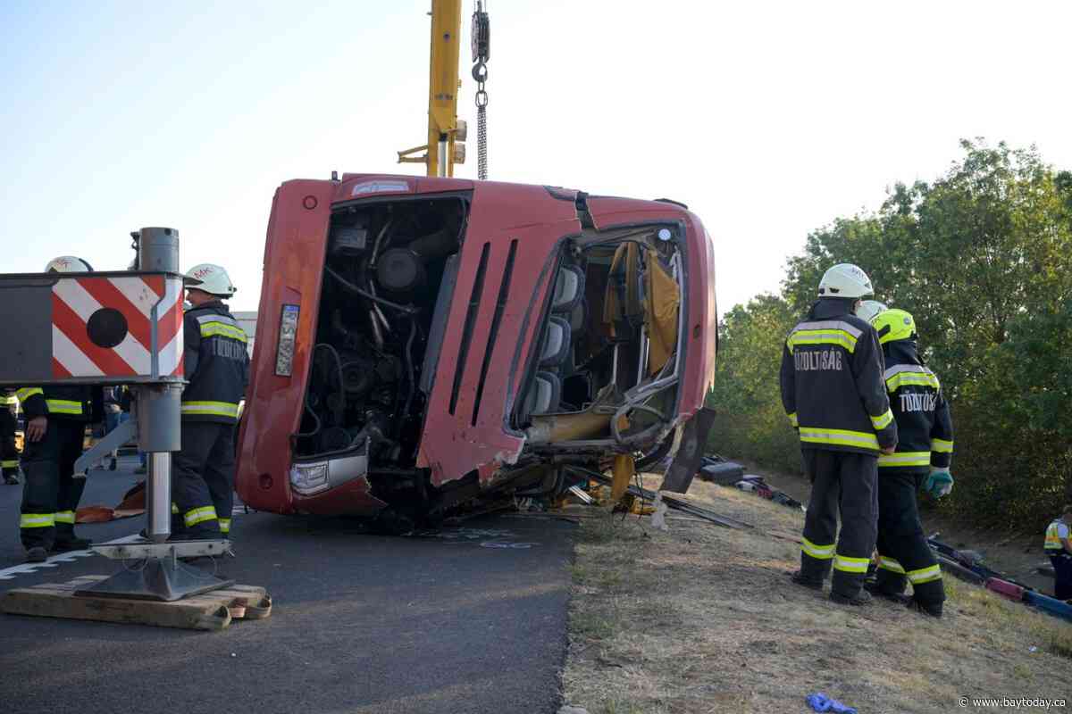 A bus crash in Hungary kills 12 people, injures at least 10 others