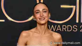 Abbey Gelmi flaunts her trim physique and toned tummy in a tulle bandeau top and see-through skirt at the 2026 Logie Awards in Sydney