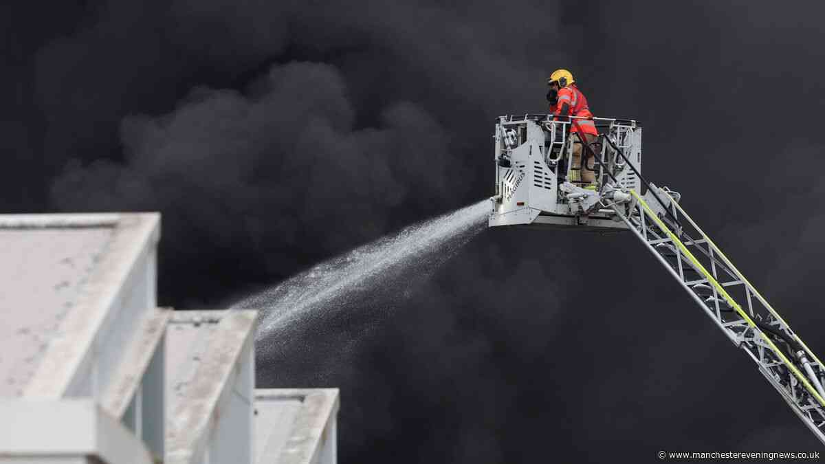 Greenfield fire LIVE as firefighters battling huge blaze near Tesco with huge plumes of smoke