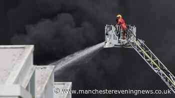 Greenfield fire LIVE as firefighters battling huge blaze near Tesco with huge plumes of smoke