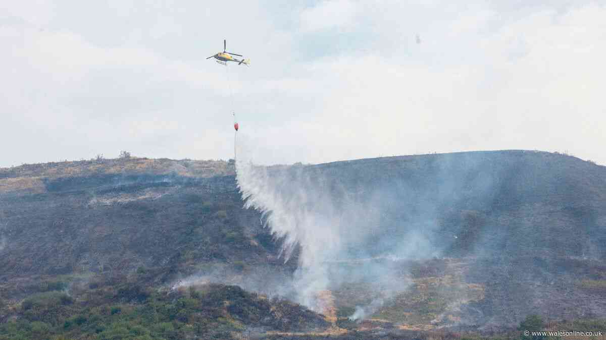 'Major incident' continues as 20 wildfires burn across Wales - live updates