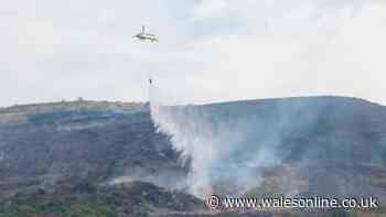 'Major incident' continues as 20 wildfires burn across Wales - live updates