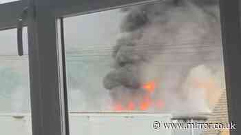 Greenfield fire - live: Firefighters warn 'stay away' as Tesco forced to close