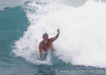 Daring surfers seek waves as Hurricane Lala approaches