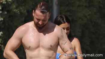 Sam Thompson shows off his buff physique as he joins bikini-clad girlfriend Talitha Balinska as they enjoy watersports on beach in Marbella