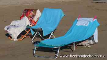 Tourists risk €500 fine if they leave towels on beach chairs in popular country