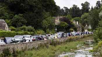 'England's prettiest village' blocks new shops and cafe as locals rail against 'overtourism' that has left roads gridlocked and car parks overflowing