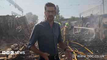 BBC visits smouldering Kyiv market after Russian strikes