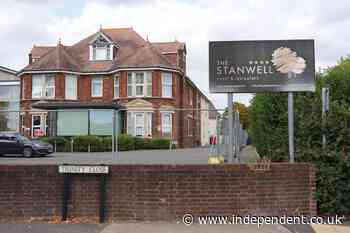Support staff worker stabbed at Surrey hotel used to house asylum seekers, MP says