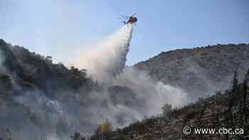 At least 2 people killed as firefighters battle massive wildfires in Greece, Belgium