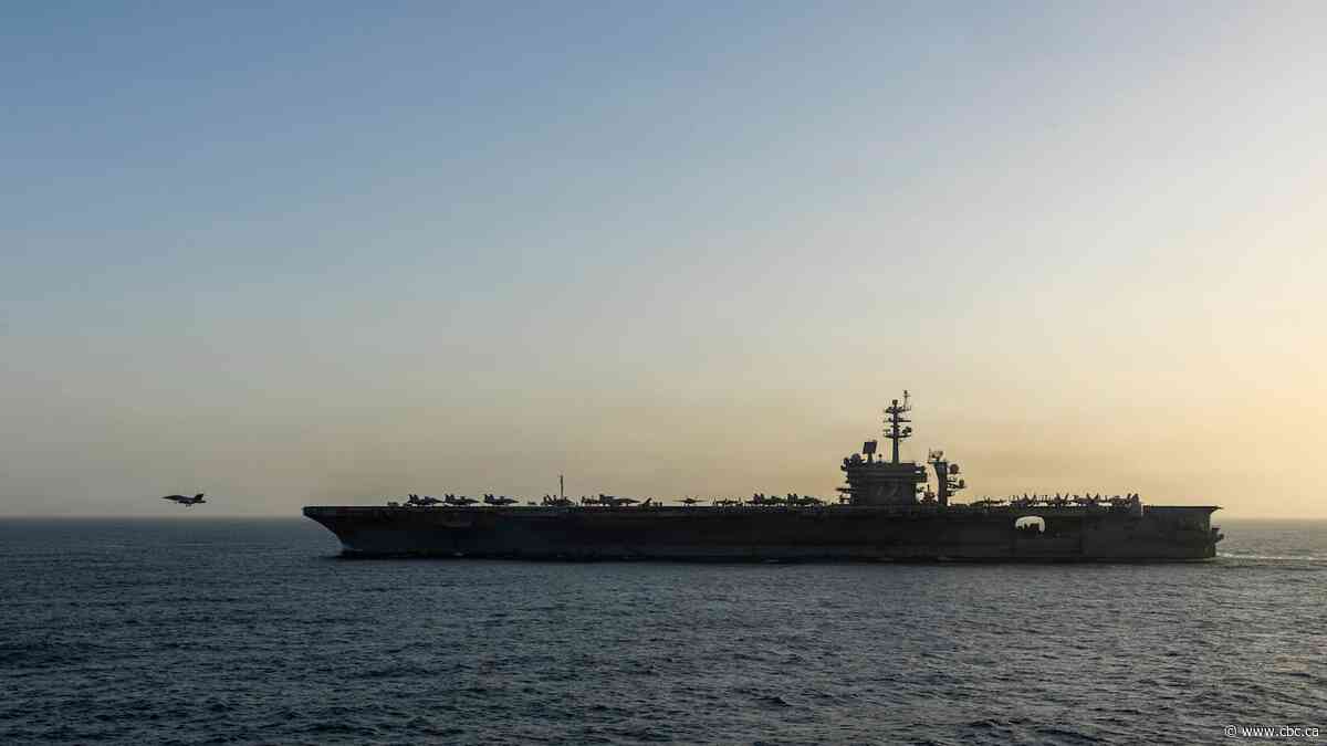 Trump dismisses reports of grim conditions on U.S. aircraft carrier